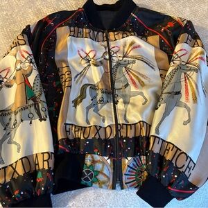 Looks like Hermes but it is not. Faux baseball jacket